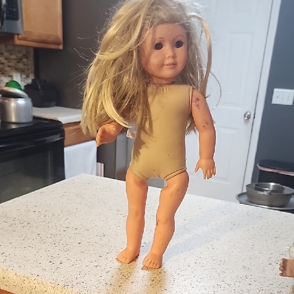 American Girl Doll with Blonde Hair and Tan Outfit